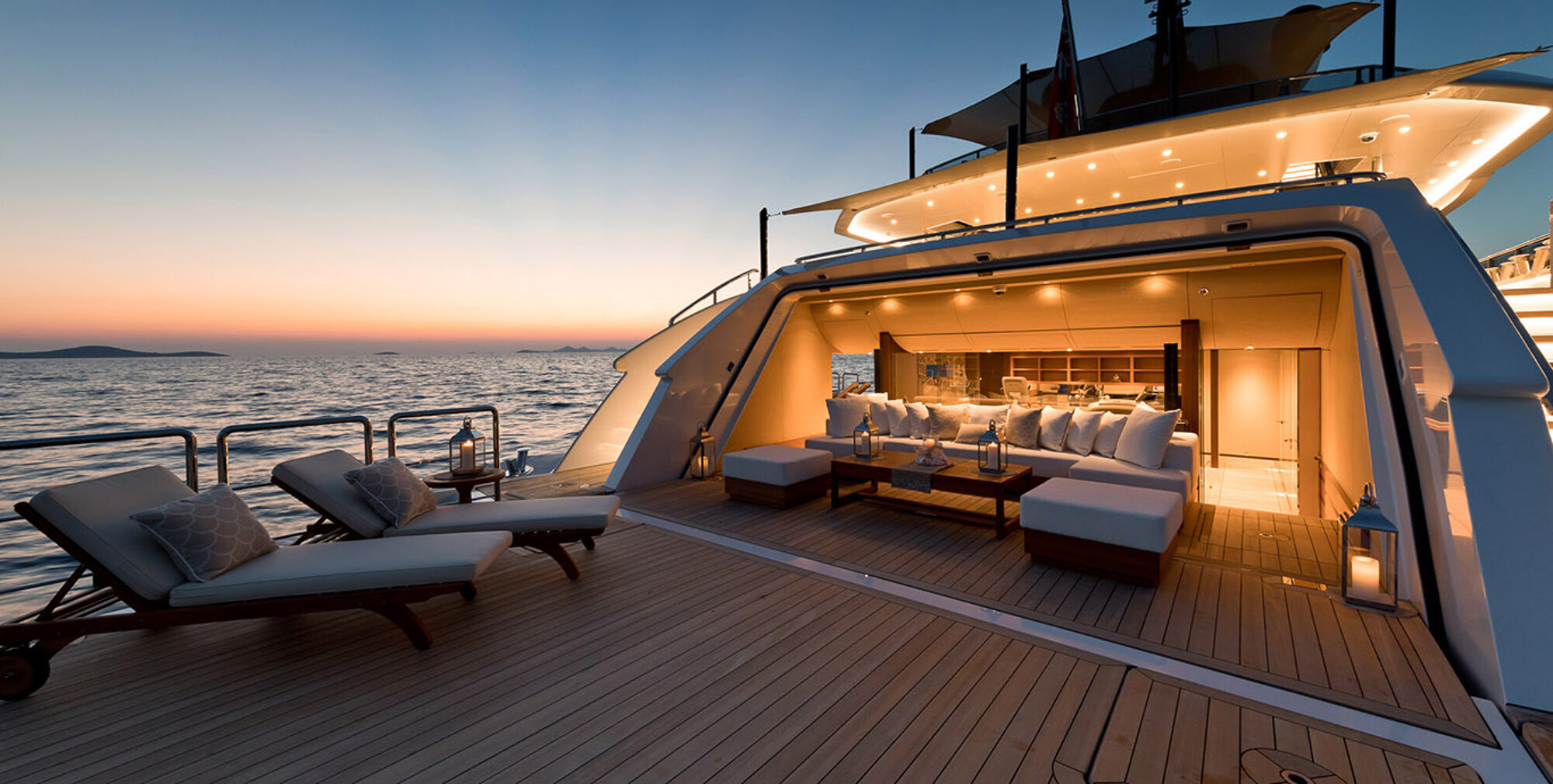 Beach club of a superyacht at sunset